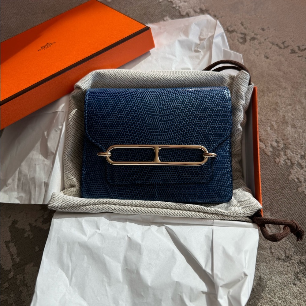 Hermès’ Bleu Saphir Shiny Lizard Roulis Wallet